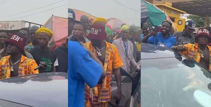 Chaos as Portable storms streets, gives out money in celebration of his wife’s birthday (Video)